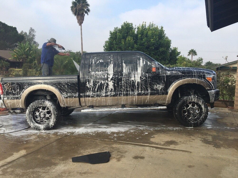 Professional mobile detailing service cleaning a pickup truck in Riverside, Inland Empire.